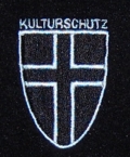 Kulturschutz - Polohemd mit Bruststick (Schwarz)